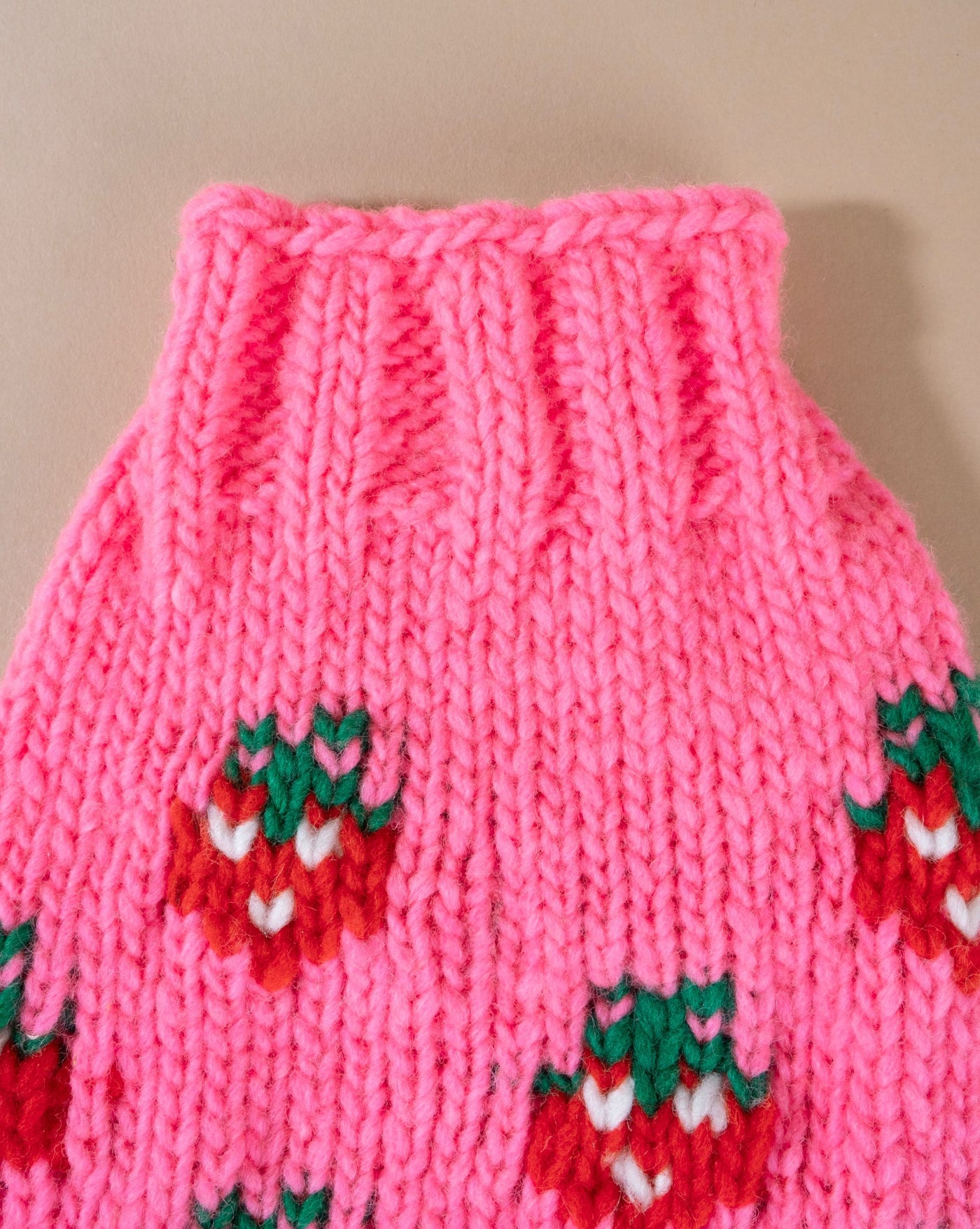 Cozy and stylish pink dog sweater for small dogs, perfect for Corgis or Doodles.