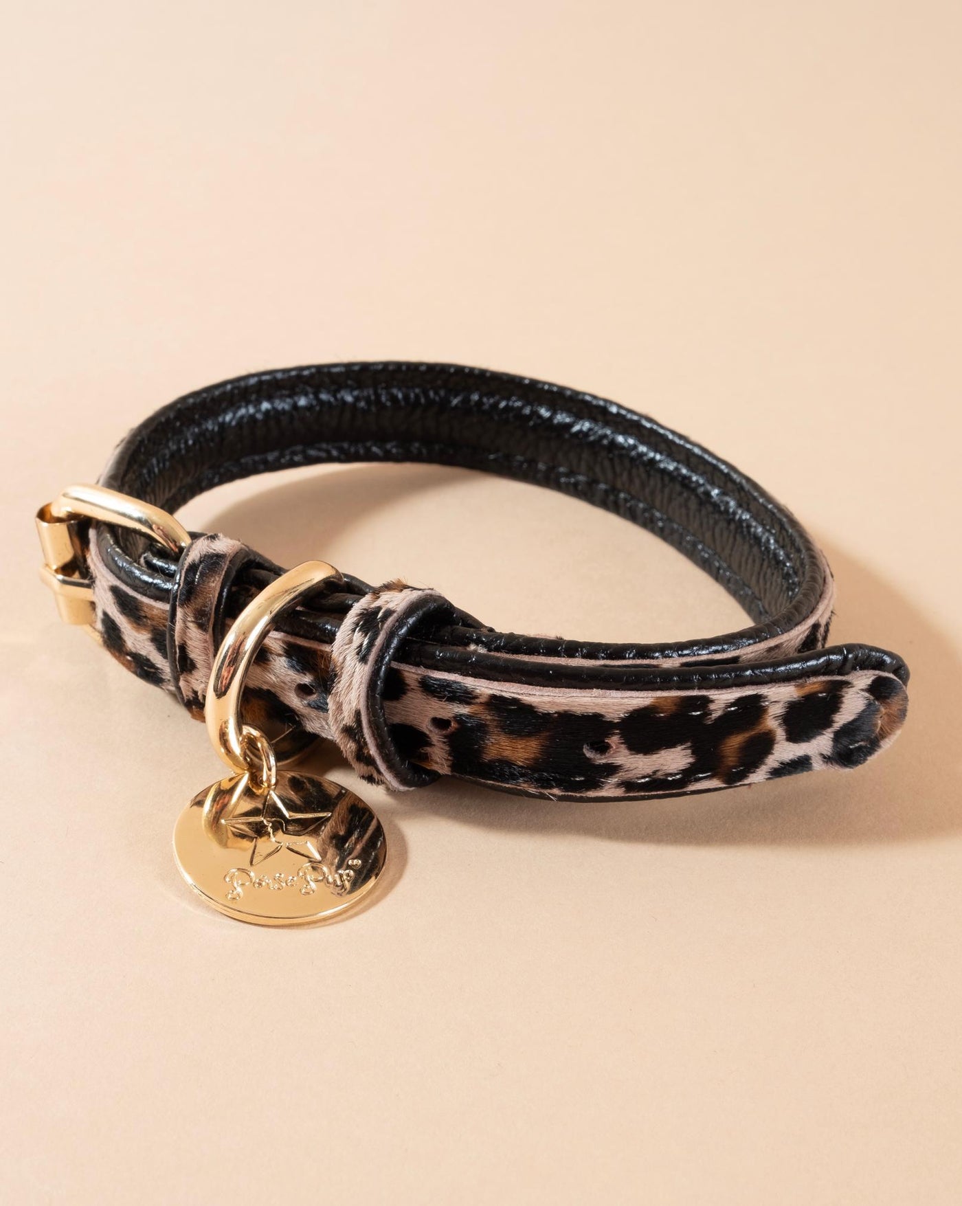 Stylish brown and tan leopard print pony hair dog collar with durable leather accents. Perfect for fashion-forward pups.