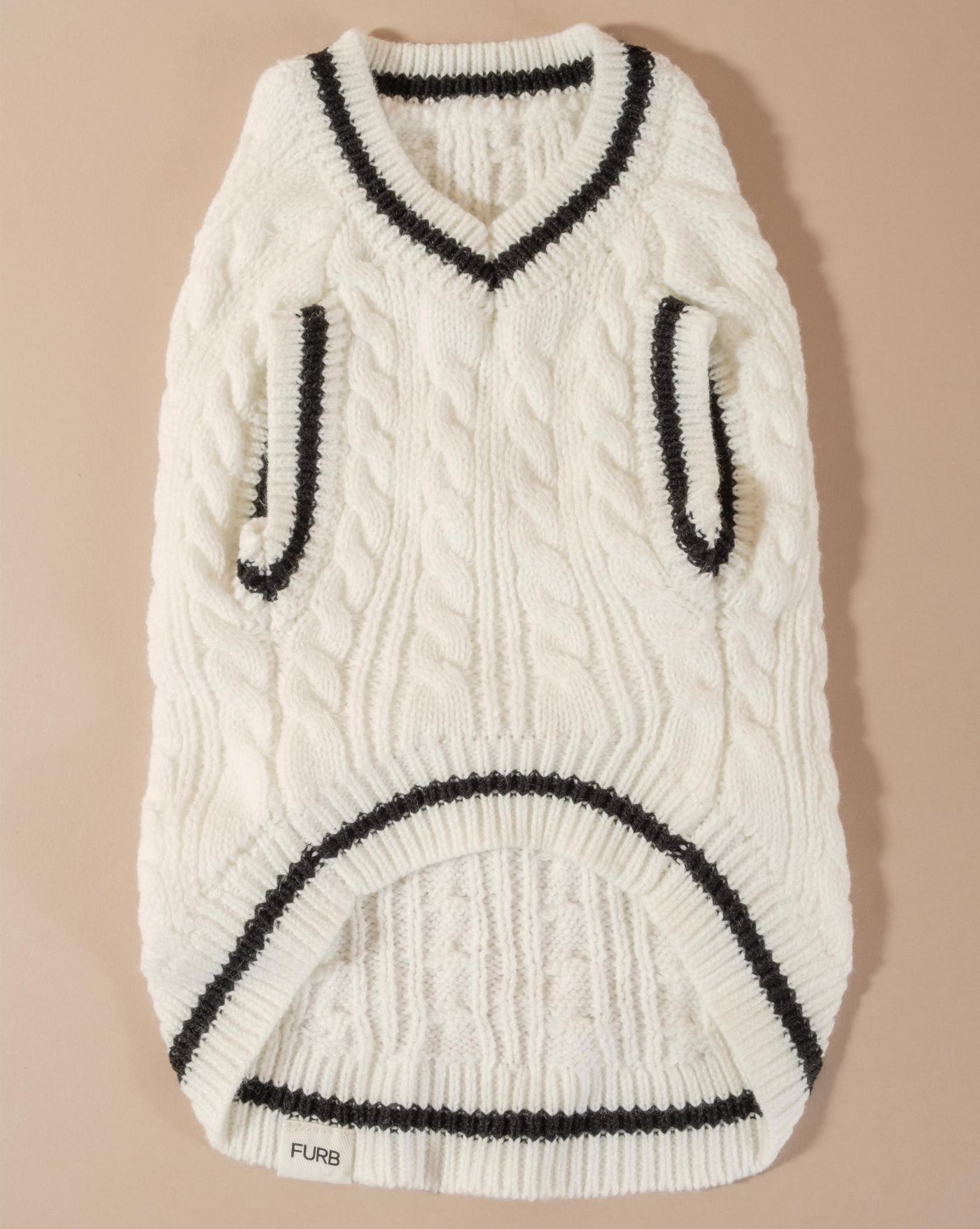 Cozy ivory cable knit sweater vest for small and medium breeds, perfect for colder weather.