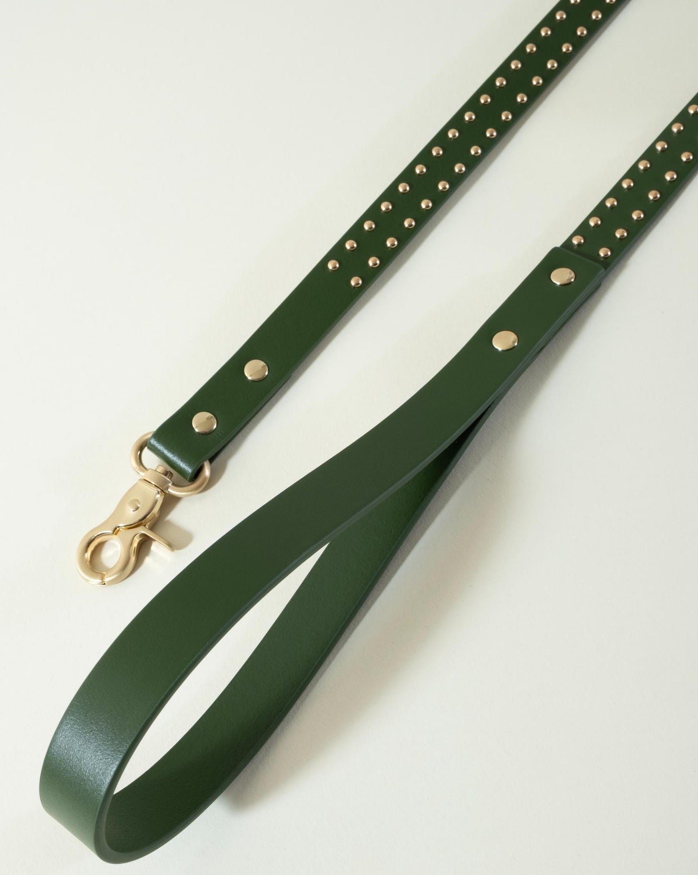 Trendy olive green leather leash with stud accents, perfect for fashionable dogs