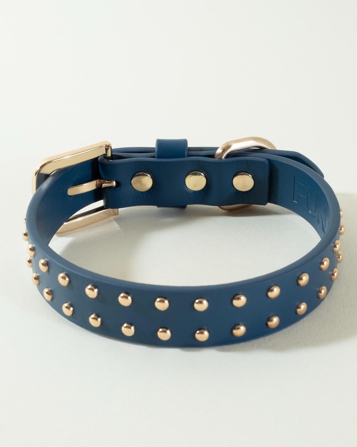 Elegant blue leather collar with studs for dogs, designed for comfort and style