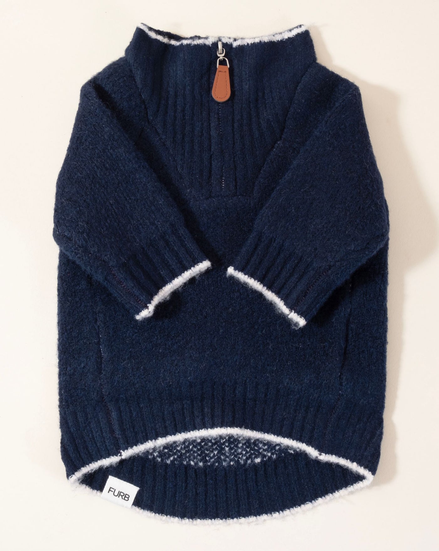 Navy blue dog sweater featuring an anchor motif, ideal for stylish nautical looks