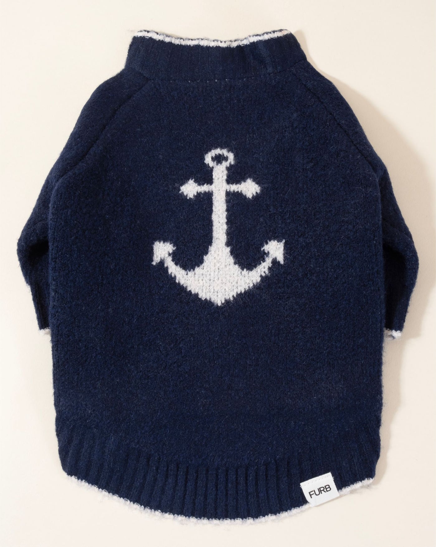 Navy blue dog sweater with anchor design, perfect for nautical themed outfits