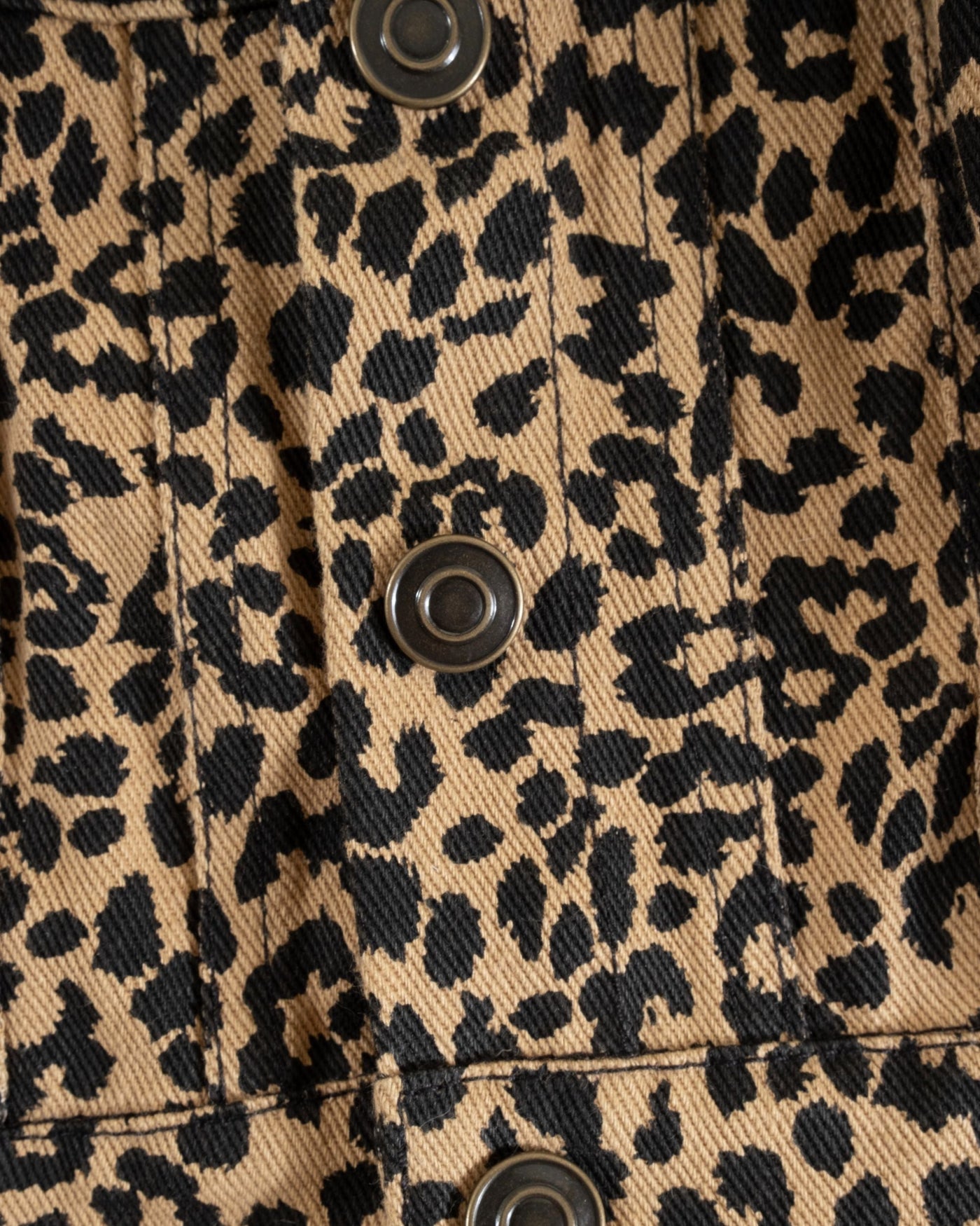 Fashionable and durable leopard print denim jacket for dogs like Cocker Spaniels and Schnauzers.