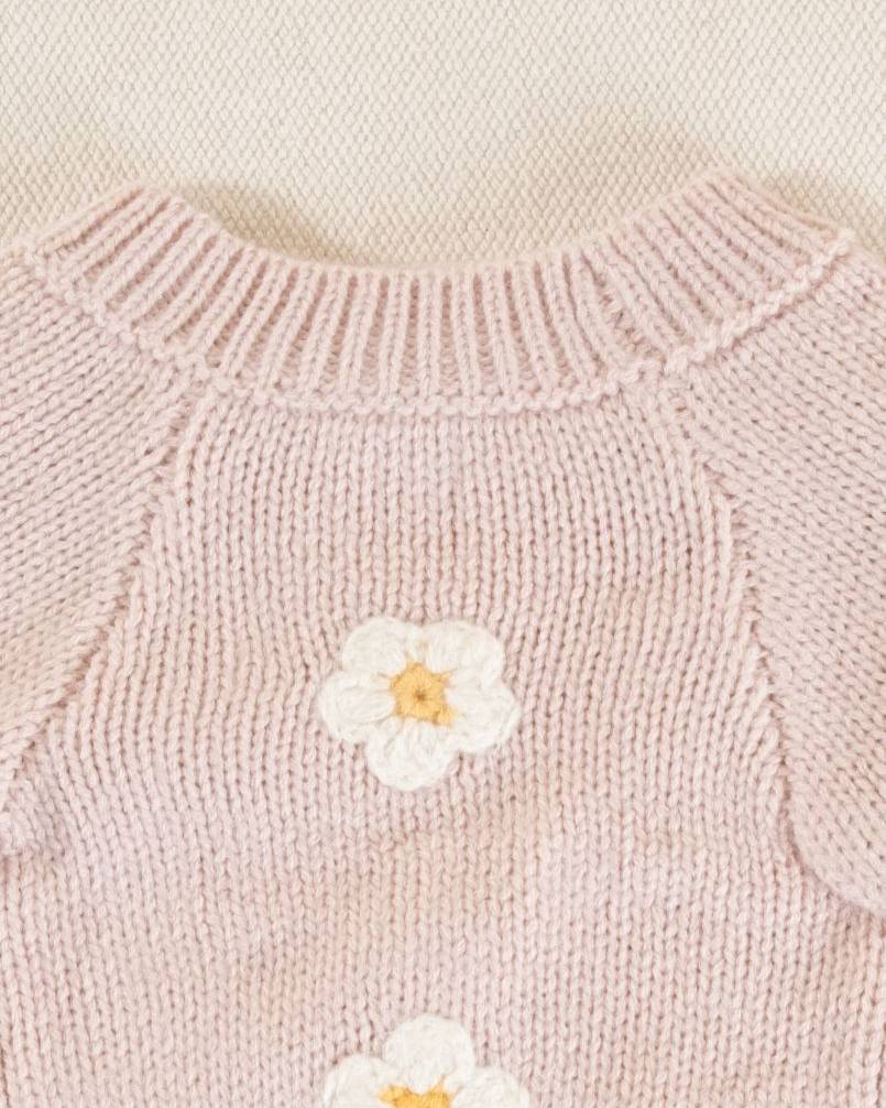 Comfortable and cute pink daisy dog sweater, perfect for small and medium breeds looking to stay stylish and warm.