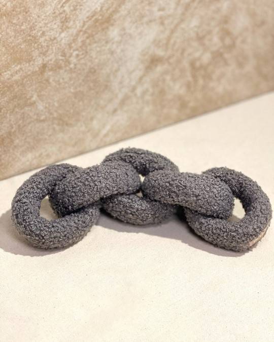 Modern grey tug toy for small and medium dogs, perfect for interactive play and fun tug-of-war sessions.