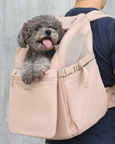 Pet Carrier Backpack in tan, stylish and functional for carrying pets comfortably.