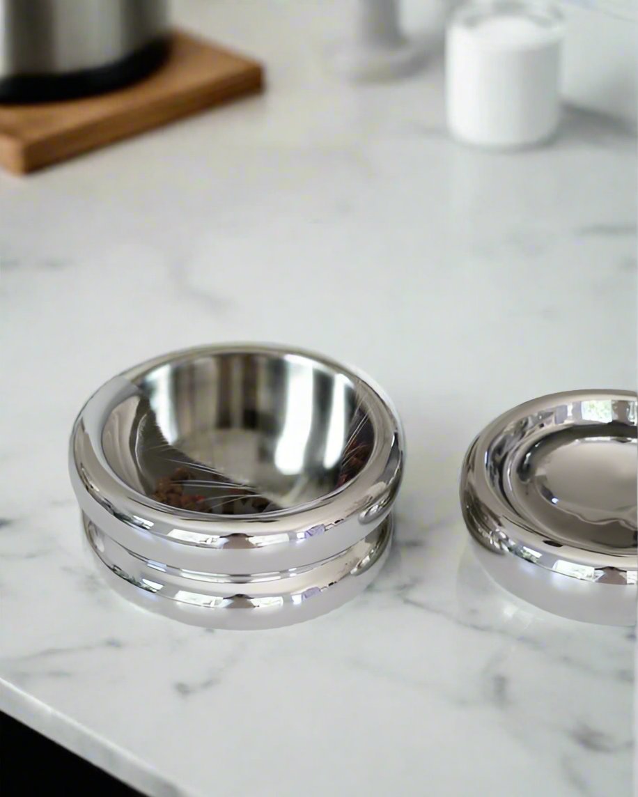 Contemporary chrome dog bowl designed for elegant meals, perfect for French Bulldogs or Yorkies.